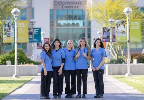 Nursing students walking on campus