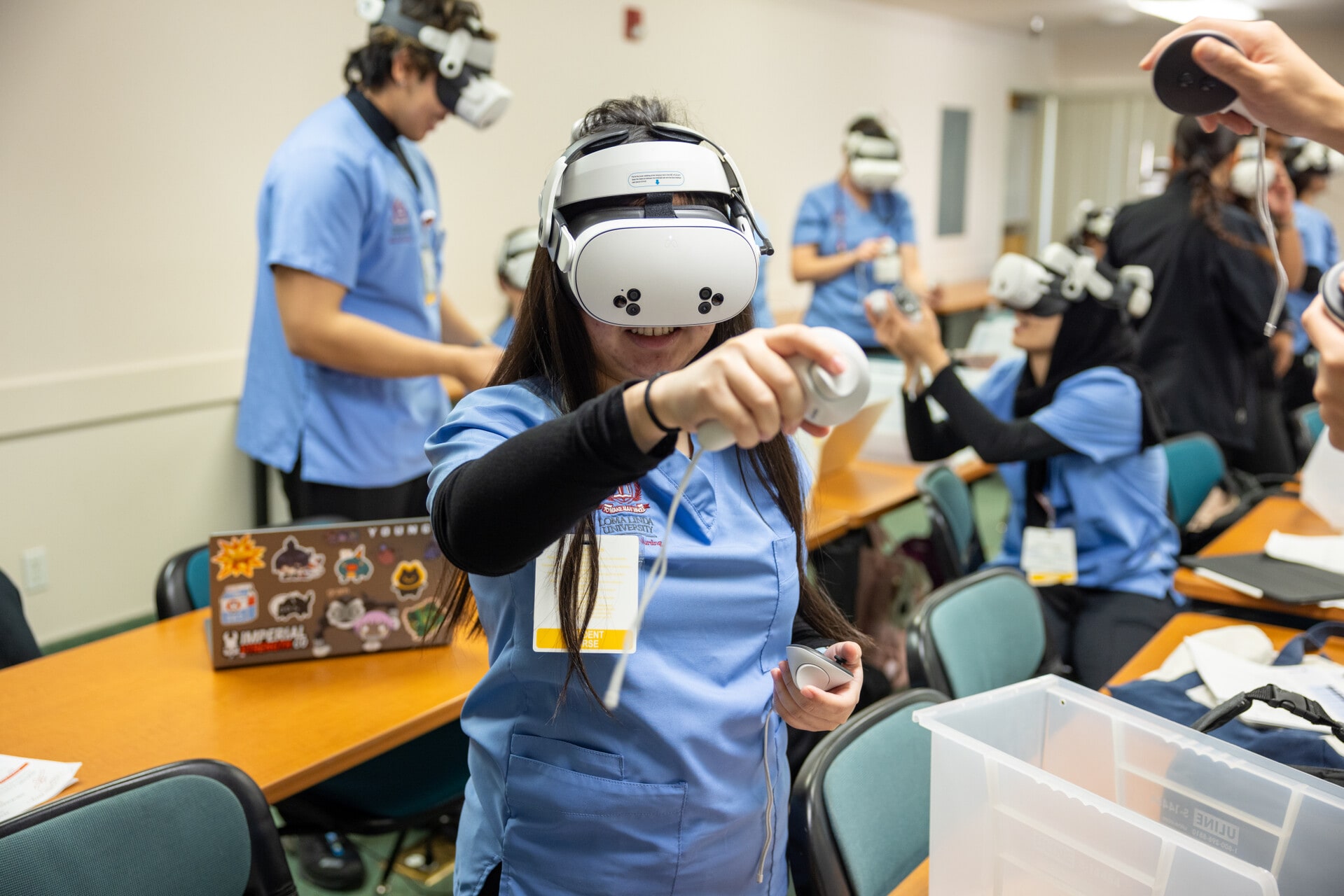 Nursing student utilizating a virtual reality headset.