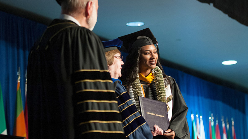 LLUSN Student Receiving Diploma