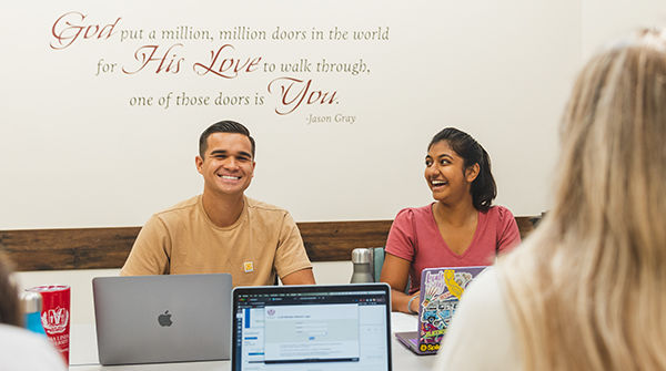 students smiling in classroom