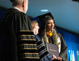 LLUSN Student Receiving Diploma